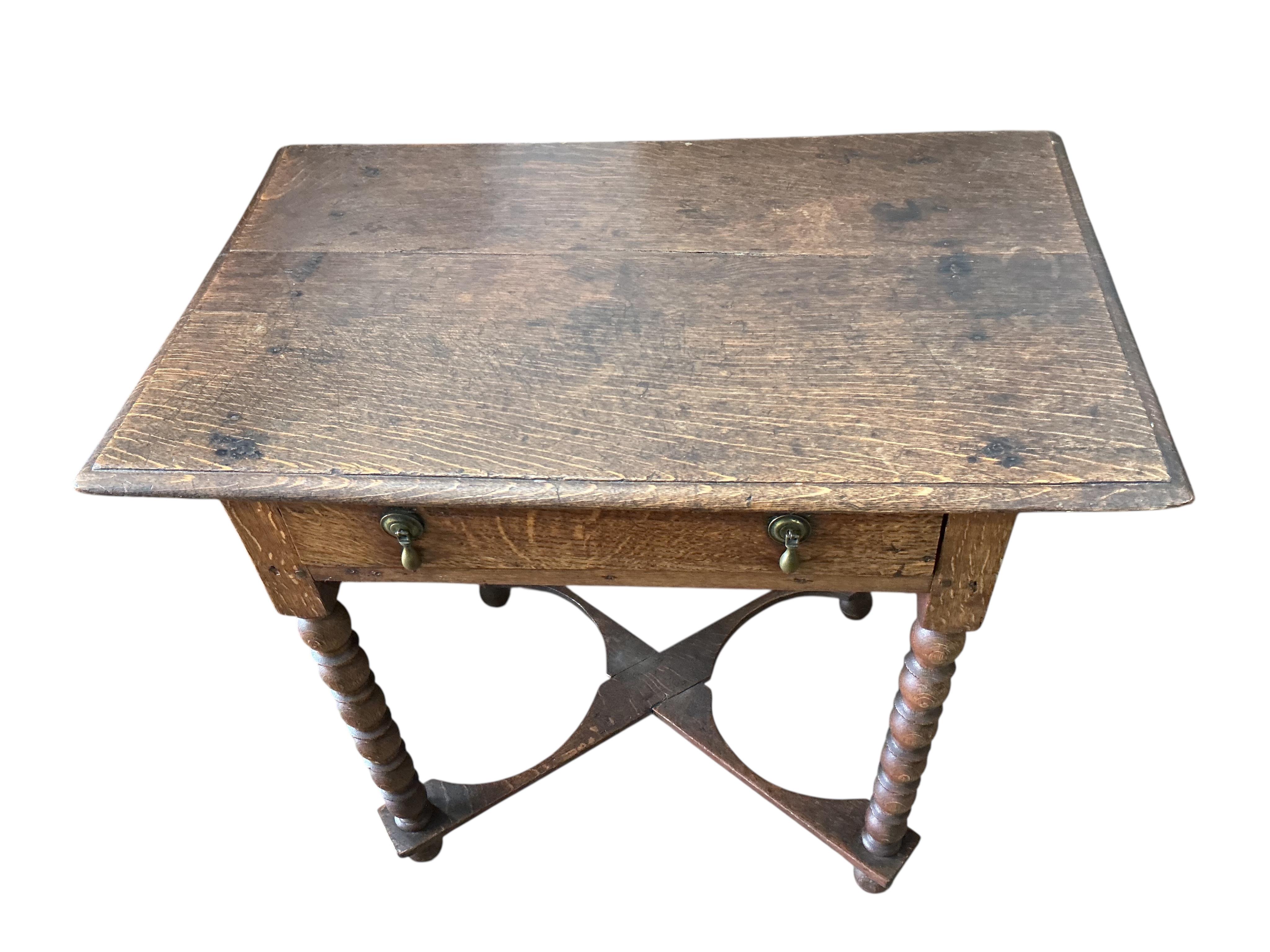 An 18th century rectangular oak bobbin leg side table, width 81cm, depth 50cm, height 71cm